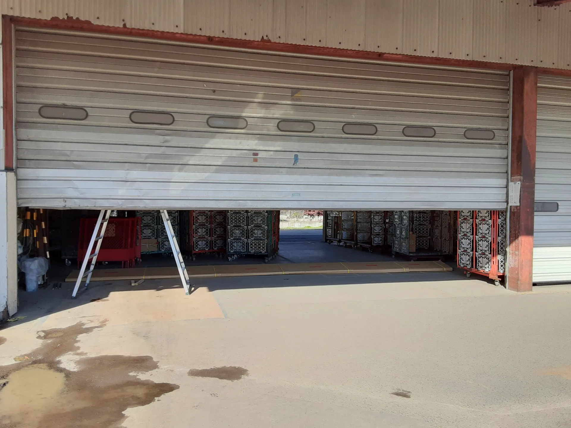 相馬の運送会社倉庫オーバードア修理事例